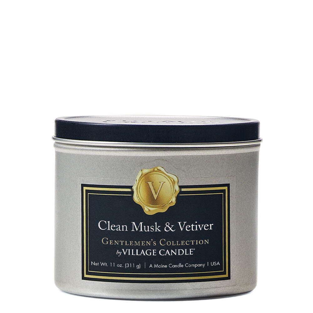 Clean Musk and Vetiver Stonewall Gentlemen’s Candle in a sleek glass container, designed for the sophisticated man. This soy blend candle features a luxurious fragrance of basil, anise, lemon, and mandarin with a base of lavender and tonka, ideal for adding a touch of elegance and calm to any setting