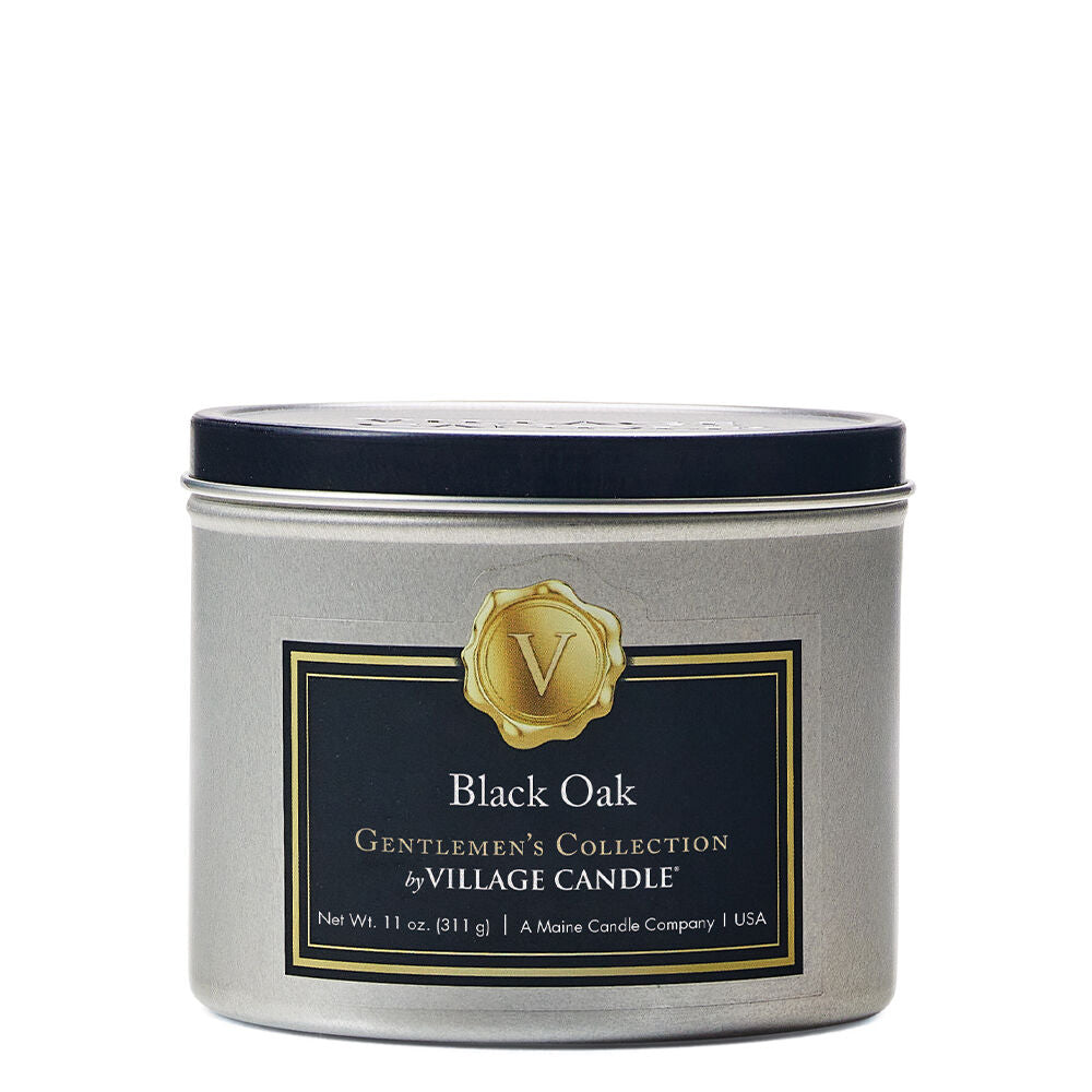 Black Oak Stonewall Gentlemen’s Candle in a sleek glass container, with a rich fragrance of charred ember haze, sandalwood, amber, oakmoss, and cedarwood, crafted with food-grade paraffin wax for a clean, even burn.