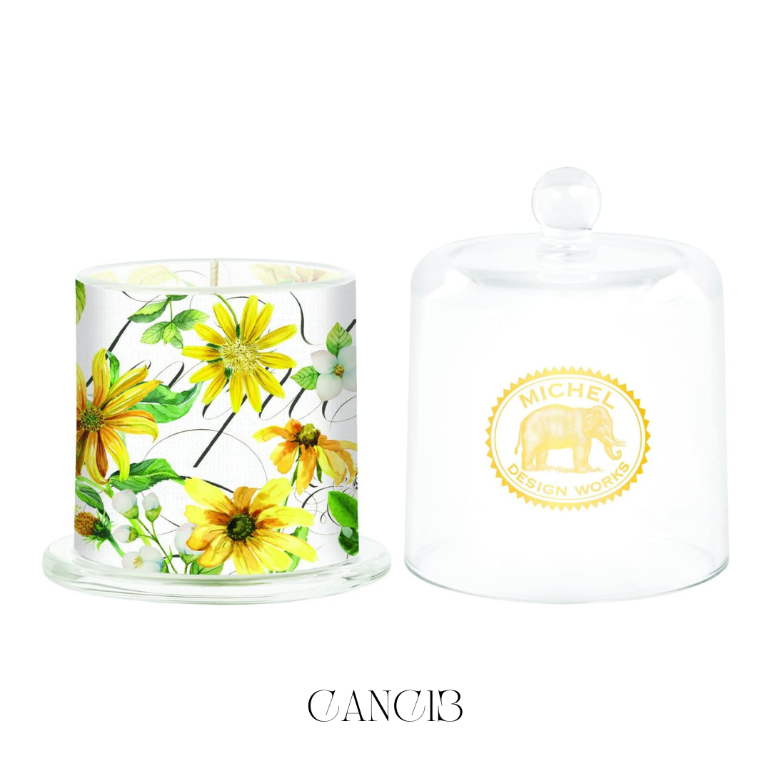 Bright Daisy Cloche Candle with a bell-shaped glass cloche cover, featuring a fresh spring daisy scent. The soy blend candle has a strong fragrance throw, adding a touch of elegance to any room.