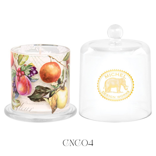 Sangria Cloche Candle, encased under a bell-shaped glass cloche, designed to release a vibrant sangria scent when lifted. This soy blend candle's strong fragrance throw includes a joyful blend of fruity and wine-like aromas, perfect for enhancing the ambiance of any gathering