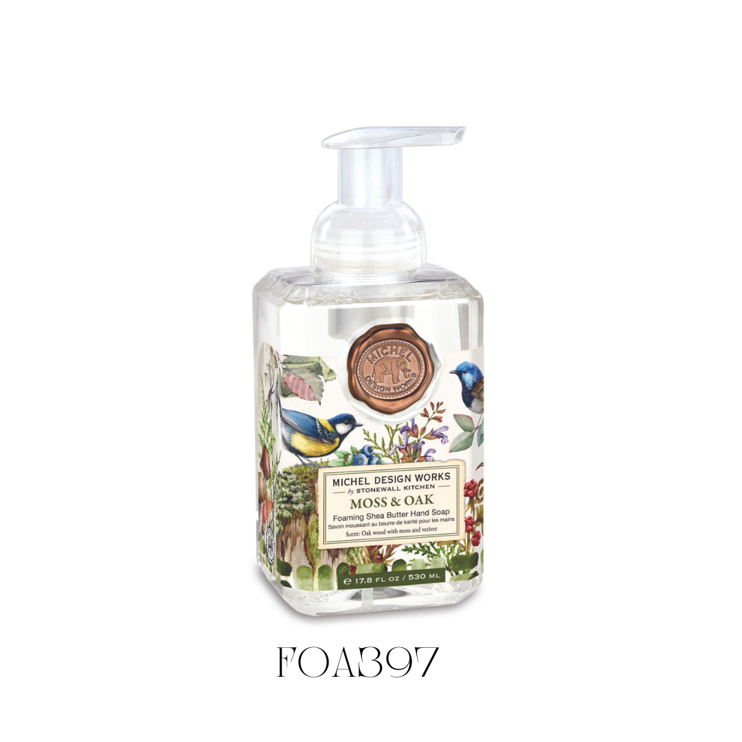 Foaming Soap Moss and Oak in a generously sized dispenser, featuring a nature-inspired design. This hand soap is enriched with premium ingredients like shea butter and aloe vera, providing gentle cleansing and moisturizing while leaving hands lightly scented with notes of oak wood, moss, vetiver, lavender, and hints of spice