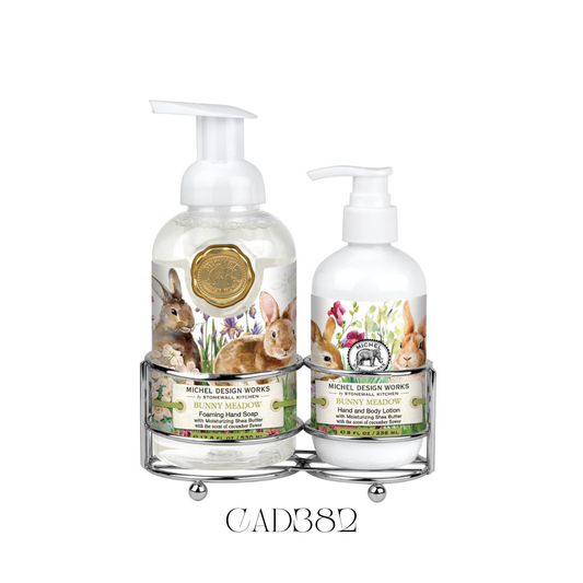 Hand Care Caddy Bunny Meadow featuring a foaming hand soap and a rich hand and body lotion, both with a fresh fragrance of spring flowers and hints of cucumber. The set is displayed in an attractive silver-toned caddy, perfect for adding a whimsical touch to kitchen counters or guest bathrooms