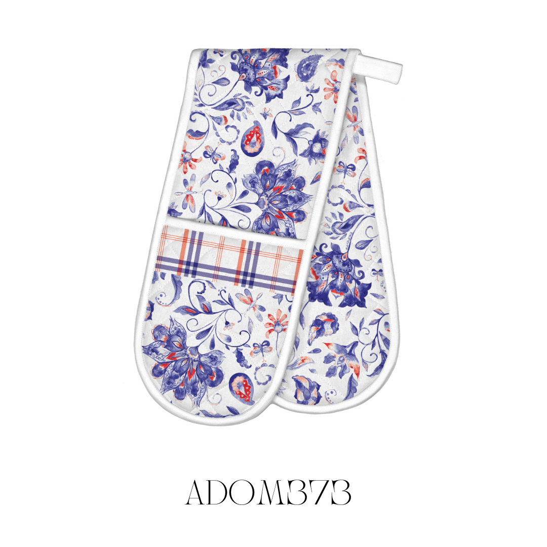 Paisley and Plaid Double Oven Mitt in use, showcasing its extra-thick padding and durable cotton construction for maximum heat resistance. The vibrant paisley and plaid pattern adds a stylish touch to any kitchen décor