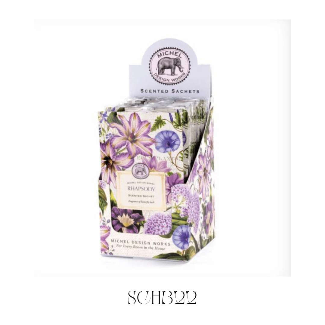 Rhapsody Scented Sachet placed in a drawer, demonstrating its use in keeping clothes and linens smelling fresh. The sachet releases a soothing blend of butterfly bush, honey, carnation, and rain, perfect for adding a gentle fragrance to storage areas
