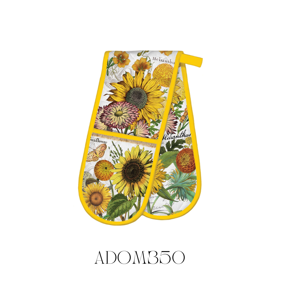 Sunflower Double Oven Mitt in use, showing its extra-thick padding and durable cotton construction, perfect for maximum heat resistance. The cheerful sunflower pattern adds a touch of brightness to kitchen décor while protecting hands from hot cookware.