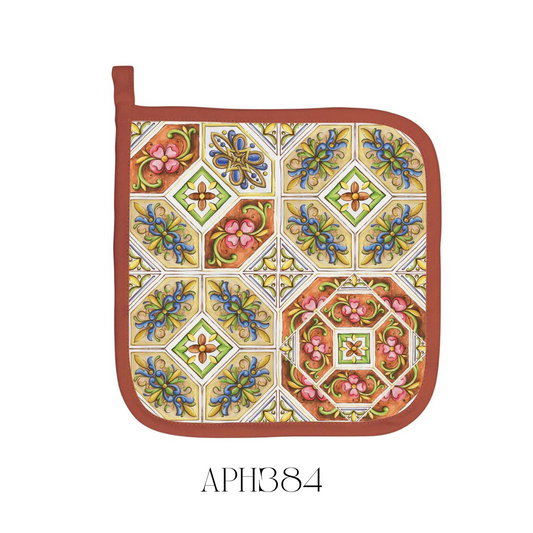 Tuscan Terrace Pot Holder in use, demonstrating its heat-resistant all-cotton material, ideal for safely handling hot dishes. The colourful design adds a touch of Tuscan charm to any kitchen décor while providing essential protection.