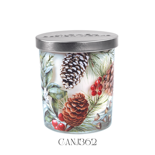 Lit White Spruce Candle Jar with its lid beside it, showcasing the elegant artwork on the glass and the warm glow of the soy blend wax. The candle emits a fresh, aromatic scent of spruce, fruit, and spice, perfect for creating a cosy, winter ambiance.